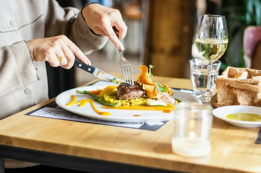 Diners enjoying food at a restaurant
